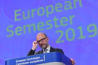 European Commissioner for Economic and Financial Affairs, Taxation and Customs Pierre Moscovici readjusts his glasses as he speaks during a press conference on the European semester 2019 package, at the European Commission in Brussels on June 5, 2019. (Photo by EMMANUEL DUNAND / AFP)
