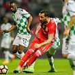 Moreirense's Ousmane Drame (L) competes for the ball with Benfica Kostas Mitroglou (C) during their Portuguese First League soccer match, held at Stadium Comendador Joaquim de Almeida Freitas,  Moreira de Conegos, 09 April 2017. OCTAVIO PASSOS/LUSA