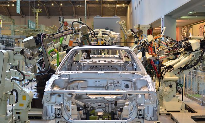 Company originally planned to manufacture 9 million cars this fiscal year through March 