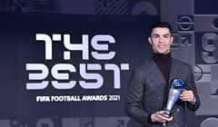 Portuguese striker Cristiano Ronaldo receives the FIFA Special Best Men Award 2021 during the Best FIFA Football Awards 2021 in Zurich on January 17, 2022. (Photo by Harold Cunningham / POOL / AFP)