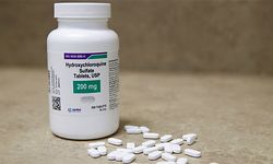 (FILES) In this file photo taken on May 20, 2020 a bottle and pills of Hydroxychloroquine sit on a counter at Rock Canyon Pharmacy in Provo, Utah. - The World Health Organization announced on June 3, 2020 that clinical trials of the drug hydroxychloroquine will resume as it searches for potential coronavirus treatments. On May 25, the WHO announced it had temporarily suspended the trials to conduct a safety review, which has now concluded there is "no reason" to change the way the trials are conducted. The UN health agency's decision came after a study published in The Lancet medical journal suggesting the drug could increase the risk of death among COVID-19 patients. (Photo by GEORGE FREY / AFP)