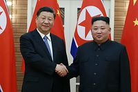 This June 20, 2019 picture released by North Korea's official Korean Central News Agency (KCNA) on June 21, 2019 shows North Korean leader Kim Jong Un (R) shaking hands with Chinese President Xi Jinping in Pyongyang. - North Korean leader Kim Jong Un held talks with Chinese President Xi Jinping in Pyongyang June 20 during a historic visit to burnish an uneasy alliance, as the two men each face challenges of their own with US President Donald Trump. (Photo by KCNA VIA KNS / KCNA VIA KNS / AFP) / South Korea OUT / ---EDITORS NOTE--- RESTRICTED TO EDITORIAL USE - MANDATORY CREDIT "AFP PHOTO/KCNA VIA KNS" - NO MARKETING NO ADVERTISING CAMPAIGNS - DISTRIBUTED AS A SERVICE TO CLIENTS / THIS PICTURE WAS MADE AVAILABLE BY A THIRD PARTY. AFP CAN NOT INDEPENDENTLY VERIFY THE AUTHENTICITY, LOCATION, DATE AND CONTENT OF THIS IMAGE --- / 