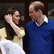 (FILES) In this file photo taken on May 2, 2015 Britain's Prince William, Duke of Cambridge, and his wife Catherine, Duchess of Cambridge show their newly-born daughter, their second child, to the media outside the Lindo Wing at St Mary's Hospital in central London.
Prince William's wife Kate was admitted to hospital in London on April 23, 2018 in the early stages of labour, Kensington Palace announced. The Duchess of Cambridge is expecting her third child, after Prince George and Princess Charlotte. The baby will be fifth in line to the British throne.
 / AFP PHOTO / LEON NEAL