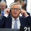 European Commission President Jean-Claude Juncker adjusts headphones before delivers his State of the Union speech at the European Parliament in Strasbourg, eastern France, on September 13, 2017.  / AFP PHOTO / PATRICK HERTZOG