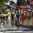 Dan Ireland's Daniel Martin celebrates as he crosses the finish line to win the sixth stage of the 105th edition of the Tour de France cycling race between Brest and Mur-de-Bretagne Guerledan, western France, on July 12, 2018. / AFP PHOTO / Marco BERTORELLO