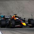 AUSTIN, TEXAS - OCTOBER 23: (1) Max Verstappen of the Netherlands driving the Oracle Red Bull Racing RB18 and Lewis Hamilton of Great Britain driving the (44) Mercedes AMG Petronas F1 Team W13 during the American F1 Grand Prix at the circuit lead the  Austin, Texas, America on October 23, 2022. Jared C. Tilton/Getty Images/AFP