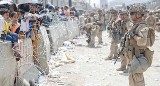 American soldiers facing Afghans desperate to leave their country at the Kabul airport