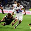 Dijon's French forward Benjamin Jeannot (L) vies with Lyon's French midfielder Nabil Fekir  (R) during the French L1 football match Lyon (OL) vs Dijon (DFCO), on September 23, 2017 at the Groupama stadium in D�cines-Charpieu near Lyon, southeastern France.  / AFP PHOTO / JEAN-PHILIPPE KSIAZEK