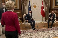 This video frame grab taken from footage released by The Turkish Presidency on April 6, 2021, shows Turkish President Recep Tayyip Erdogan (R) receiving EU Council President Charles Michel (C) and President of EU Commission Ursula von der Leyen (L) at the Presidential Complex in Ankara. - The European Commission hit out April 7, 2021, at a diplomatic snub that left its head Ursula von der Leyen without a chair as male counterparts sat down at a meeting with Turkish President Recep Tayyip Erdogan. Video from the April 6, 2021, encounter in Ankara showed von der Leyen flummoxed as the Turkish leader and European Council president Charles Michel took the only two chairs in front of their flags. (Photo by - / various sources / AFP) / RESTRICTED TO EDITORIAL USE - MANDATORY CREDIT "AFP PHOTO /TURKISH PRESIDENTIAL PRESS SERVICE " - NO MARKETING - NO ADVERTISING CAMPAIGNS - DISTRIBUTED AS A SERVICE TO CLIENTS