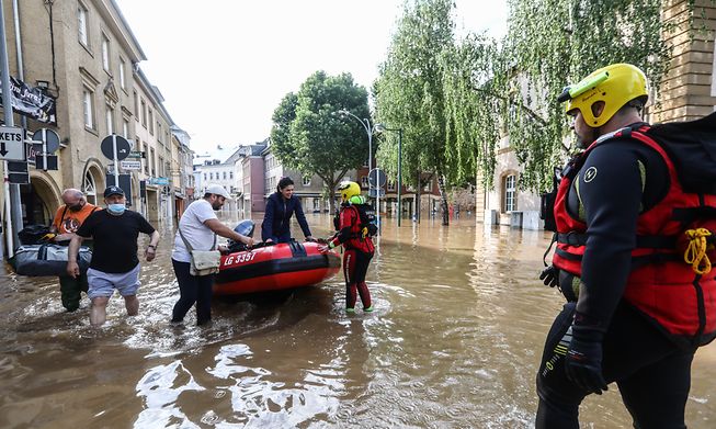 The emergency services help Echternach residents after torrential downpours flood the town