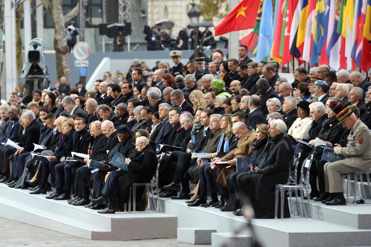 Heads of State and Government attend a ceremony at the Arc de Triomphe in Paris on November 11, 2018 as part of commemorations marking the 100th anniversary of the 11 November 1918 armistice, ending World War I. (Photo by ludovic MARIN / POOL / AFP)