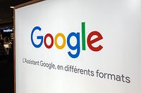 (FILES) A file photo taken on July 30, 2018 shows the logo of US multinational technology company Google with the subtitle in French "Google Assistant in different formats" at a store in Lille, northern France. - Google said on January 23, 2019, it would appeal a record 50-million-euro fine imposed by France's data regulator for failing to meet the EU's strict new General Data Protection Regulation (GDPR). (Photo by DENIS CHARLET / AFP)