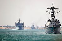 In this May 9, 2019, photo released by the US Navy, the Abraham Lincoln Carrier Strike Group  transits the Suez Canal. - The carrier group passed through the Suez Canal May 9, Egyptian authorities said, as the group heads towards the Gulf amid rising tensions between Washington and Tehran. (Photo by Darion Chanelle Triplett / Navy Office of Information / AFP) / RESTRICTED TO EDITORIAL USE - MANDATORY CREDIT "AFP PHOTO / US NAVY / Mass Communication Specialist 3rd Class Darion Chanelle Triplett" - NO MARKETING NO ADVERTISING CAMPAIGNS - DISTRIBUTED AS A SERVICE TO CLIENTS