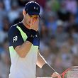 Britain's Andy Murray reacts during Men's singles second round match against Britain's Kyle Edmund at the ATP Nature Valley International tennis tournament in Eastbourne, southern England on June 27, 2018. / AFP PHOTO / Glyn KIRK
