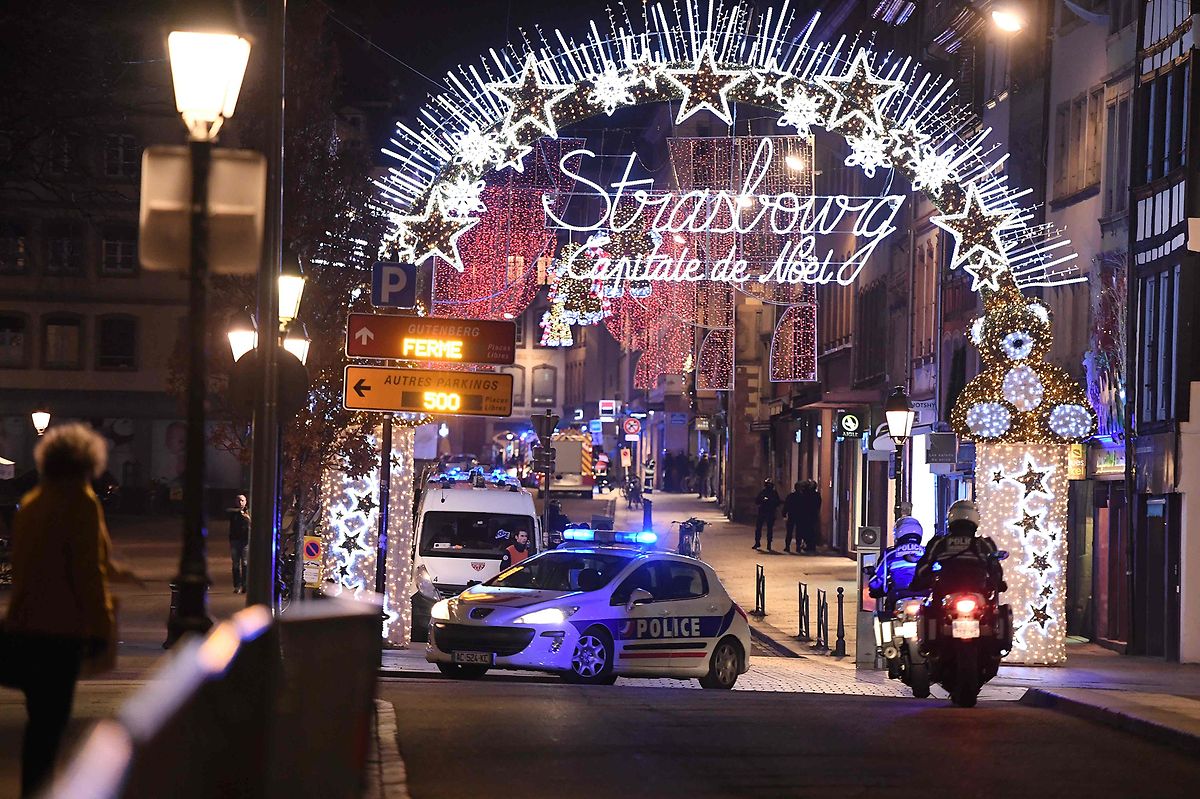 A police car drives in the streets of Strasbourg, eastern France, after a shooting breakout, on 11 December Photo: AFP