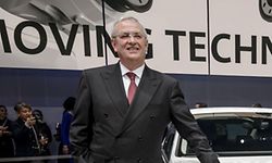 (FILES) This file photo taken on March 2, 2015 shows then chairman of the board of German carmaker Volkswagen Group, Martin Winterkorn, posing with the Car of the Year 2015, a Volkswagen Passat, during a preview of Volkwagen Group ahead of the Geneva Car Show in Geneva.
Top Volkswagen officials knew about the company's "dieselgate" emissions-cheating software at least a month before they claim to have discovered the scandal, German media reported on January 10, 2017. / AFP PHOTO / FABRICE COFFRINI