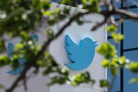 The Twitter logo is seen at their headquarters on April 26, 2022 in downtown San Francisco, California. - Billionaire Elon Musk is capturing a social media prize with his deal to buy Twitter, which has become a global stage for companies, activists, celebrities, politicians and more. (Photo by Amy Osborne / AFP)