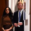 Britain's Prince Harry, Duke of Sussex and Meghan, Duchess of Sussex react during their visit to Canada House, in thanks for the warm Canadian hospitality and support they received during their recent stay in Canada,  in London on January 7, 2020. (Photo by DANIEL LEAL-OLIVAS / POOL / AFP)