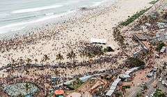 A general view taken on January 1, 2020 shows thousands of New Year's day revellers and holidaymakers gathering on North Pier Beach swimming pools during New Year festivities in Durban. - According to police close to 100,000 people are expected to spend the day at the beach. (Photo by Rajesh JANTILAL / AFP)