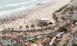 A general view taken on January 1, 2020 shows thousands of New Year's day revellers and holidaymakers gathering on North Pier Beach swimming pools during New Year festivities in Durban. - According to police close to 100,000 people are expected to spend the day at the beach. (Photo by Rajesh JANTILAL / AFP)