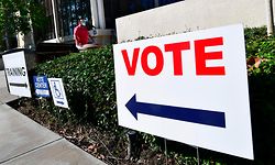 A voter arrives to cast his ballot for the 2020 US Elections at an official Orange County ballot drop-box at the Orange County Registrar's Office in Santa Ana, California on October 13, 2020. - The Republican Party in California has locked horns with state authorities, saying it will defy a cease-and-desist order to remove unauthorized ballot boxes it has put up in three counties across the state. (Photo by Frederic J. BROWN / AFP)