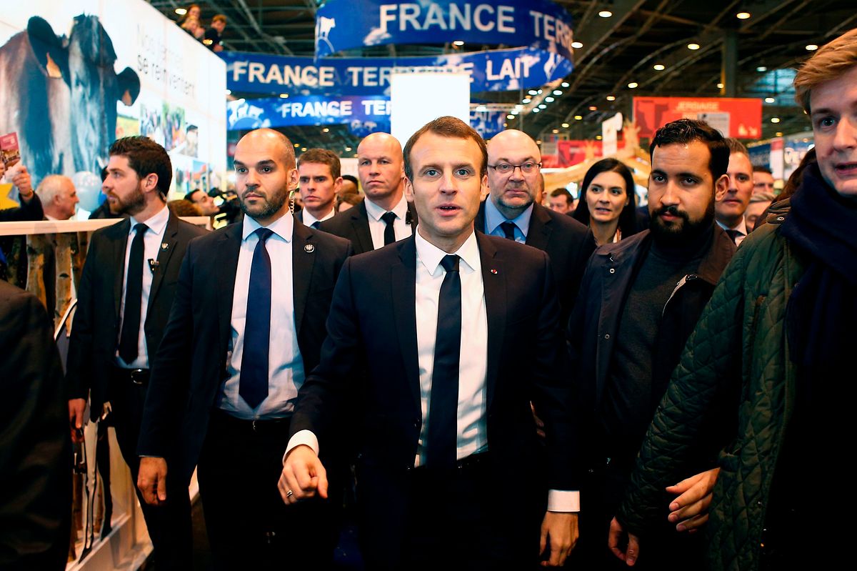 French President Emmanuel Macron visits the 55th International Agriculture Fair at the Porte de Versailles exhibition center in Paris on 24 February 2018 (AFP)