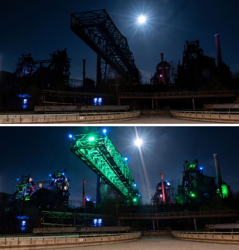 Die Lichtinstallation des Künstlers Jonathan Park (unten) am ehemaligen Hüttenwerk im Landschaftspark Duisburg Nord ist während Aktion unbeleuchtet (oben).