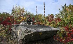 A ukrainian soldier sits atop a BMP infantry fighting vehicle in Kramatorsk, eastern Ukraine, on October 2, 2022, amid the Russian invasion of Ukraine. (Photo by Juan BARRETO / AFP)