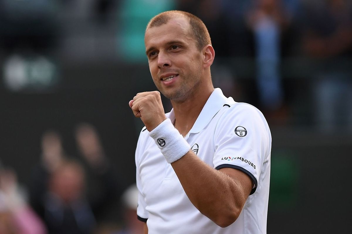 Luxembourg's Gilles Muller reacts after winning against Spain's Rafael Nadal during their men's singles fourth round match on the seventh day of the 2017 Wimbledon Championships at The All England Lawn Tennis Club in Wimbledon, southwest London, on July 10, 2017.
Muller won the match 6-3, 6-4, 3-6, 4-6, 15-13. / AFP PHOTO / Glyn KIRK / RESTRICTED TO EDITORIAL USE