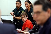 Marjory Stoneman Douglas High School shooter Nikolas Cruz is escorted from the courtroom after his sentencing at the Broward County Courthouse in Fort Lauderdale on November 2, 2022. - Cruz, who pleaded guilty to 17 counts of premeditated murder in the 2018 shootings, is the most lethal mass shooter to stand trial in the US. The hearing concluded today, November 2, 2022 when Circuit Judge Elizabeth Scherer sentenced Parkland school shooter Nikolas Cruz to life in prison without parole. (Photo by Amy Beth Bennett / POOL / AFP)