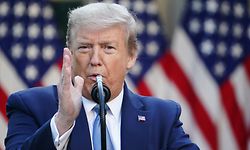US President Donald Trump gestures as he speaks during the daily briefing on the novel coronavirus, which causes COVID-19, in the Rose Garden of the White House on April 15, 2020, in Washington, DC. (Photo by MANDEL NGAN / AFP)