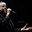 (FILES) Belgian singer Arno performs on stage at the Trianon Theater in Paris in this file photo taken on February 11, 2020.  - Belgian singer Arno died at the age of 72, according to his agent on April 23, 2022.  (Photo by Christophe ARCHAMBAULT / AFP)