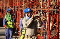 DOHA, QATAR - DECEMBER 30:  Construction workers on Khalifa International Stadium ahead of the 2022 FIFA World Cup Qatar on December 30, 2015 in Doha, Qatar.  (Photo by Warren Little/Getty Images)