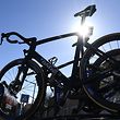 This picture taken on March 13, 2020 show bicycles fixed on the roof of a official cycling team car prior the start of the 161,5 km,  6th stage of the 78th Paris - Nice cycling race stage between Sorgues  and Apt, on March 13, 2020. - The organizers of the 78th Paris-Nice cycling race announced on March 13, 2020 the cancellation of the last stage scheduled for Sunday due to the coronavirus pandemic. (Photo by Alain JOCARD / AFP)