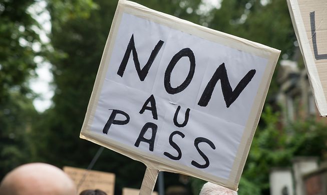 Protesters speaking out against the so-called Covid passport