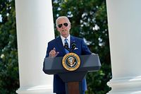 US President Joe Biden speaks before signing two bills aimed at combating fraud in the Covid-19 small business relief programs at the White House in Washington, DC, on August 5, 2022. (Photo by Evan Vucci / POOL / AFP)