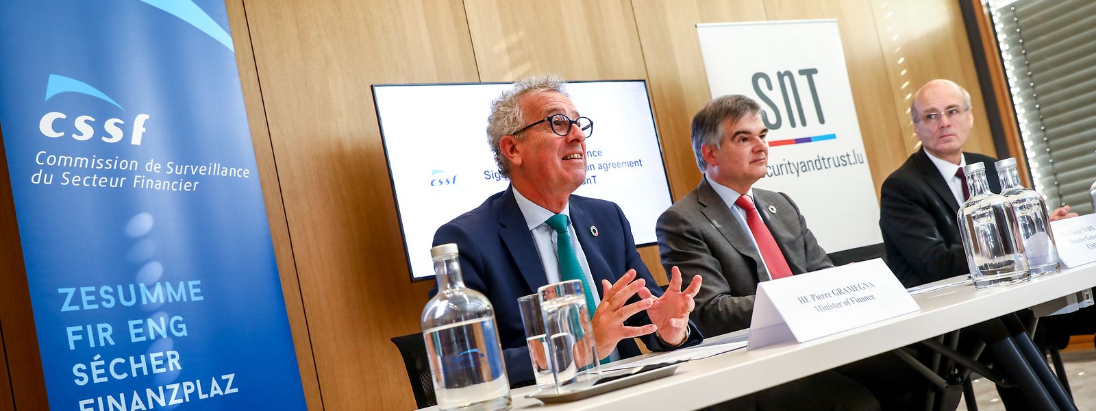 Le ministre Pierre Gramegna, le directeur général de la CSSF Claude Marx et le directeur du SnT Björn Ottersten