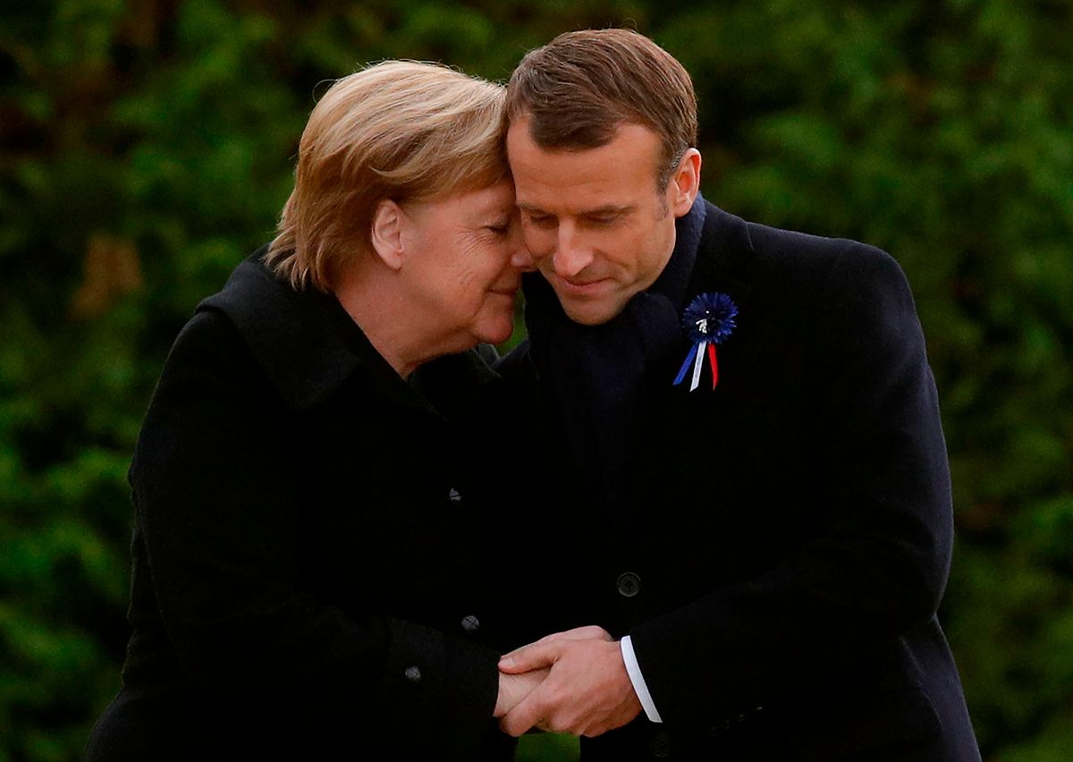 Macron and Merkel after unveiling a plaque during the ceremony Photo: AFP