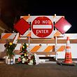 MONTEREY PARK, CALIFORNIA - JANUARY 22: A temporary memorial near the scene of the shooting in Monterey Park, California on January 22, 2023. Monterey Park dancing near Chinese New Year celebrations on Saturday night Ten people were killed and another 10 injured in the studio.Eric Thayer/Getty Images/AFP (Photo by Eric Thayer/GETTY IMAGES NORTH AMERICA/Getty Images via AFP)
