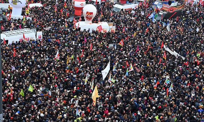 Demonstrators gather at Place de la Republique during a rally called by French trade unions in Paris, January 19, 2023