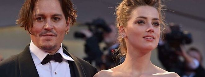 Amber Heard, hier mit Johnny Depp beim Filmfestival Venedig, kann laut australischem Gesetz zu zehn Jahren Haft oder einer Geldstrafe bis zu 100 000 australischen Dollar (etwa 67 000 Euro) verurteilt werden.