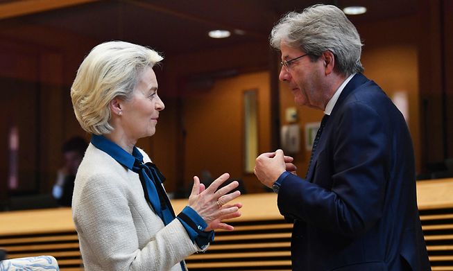 Paolo Gentiloni, European Commissioner for the Economy, said on Monday the Commission would suspend the bloc's fiscal rules for another year. Here he is seen talking to his boss, Commission President Ursula von der Leyen, in Brussels last week.