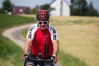 Unterwegs mit: .... Jean Asselborn und seinem Rennrad- Foto: Pierre Matgé/Luxemburger Wort