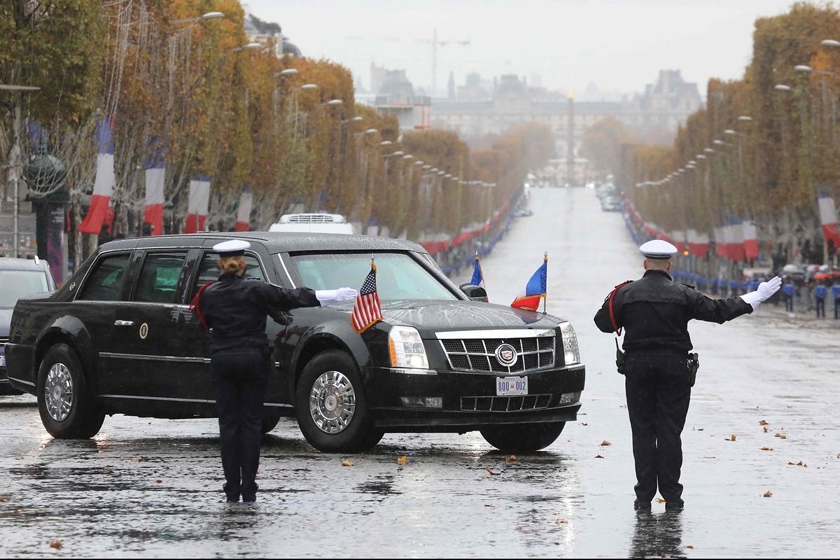 The armored limousine known as "The Beast" carrying US president arrives ahead of a ceremony at the Arc de Triomphe in Paris on November 11, 2018 as part of commemorations marking the 100th anniversary of the 11 November 1918 armistice, ending World War I. (Photo by ludovic MARIN / POOL / AFP)