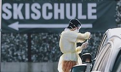 A Red Cross employee takes a smear test in suspicious cases at the Coronavirus Drive-In test station in Schuettdorf, Zell am See, Austria on March 26, 2020. (Photo by JFK / APA / AFP) / Austria OUT