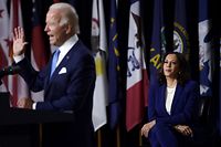 Democratic vice presidential running mate, US Senator Kamala Harris, listens to presidential nominee and former US Vice President Joe Biden speak during their first press conference together in Wilmington, Delaware, on August 12, 2020. (Photo by Olivier DOULIERY / AFP)