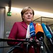 German Chancellor Angela Merkel answers journalists' questions on the sidelines of a session of the Committee of Foreign Affairs of the Bundestag (lower house of parliament) on January 16, 2019 in Berlin. - Merkel said "we still have time to negotiate" after the British parliament overwhelmingly rejected Prime Minister's deal on leaving the European Union. (Photo by Kay Nietfeld / dpa / AFP) / Germany OUT