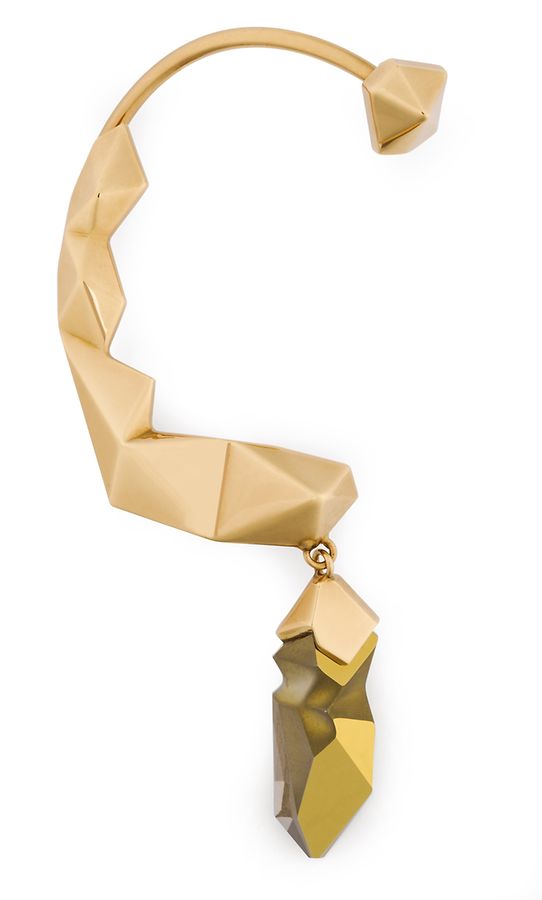 Sie besticht durch unregelmäßig facettierte Kristalle und ein schoko-goldenes Finish.