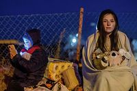Helena e o irmão Bodia, de Lviv, na fronteira ucraniana com a Polónia. 