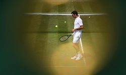 (FILES) In this file photo taken on July 6, 2017 Switzerland's Roger Federer attends a practice session at The All England Lawn Tennis Club in Wimbledon, southwest London, on the fourth day of the 2017 Wimbledon Championships. - Swiss tennis legend Roger Federer is to retire after next week's Laver Cup, he said on September 15, 2022. (Photo by Oli SCARFF / AFP) / RESTRICTED TO EDITORIAL USE